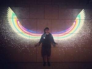 Daniel Ma interacting with his work at the Getty